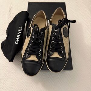 CHANEL Black and Cream Quilted Sneakers